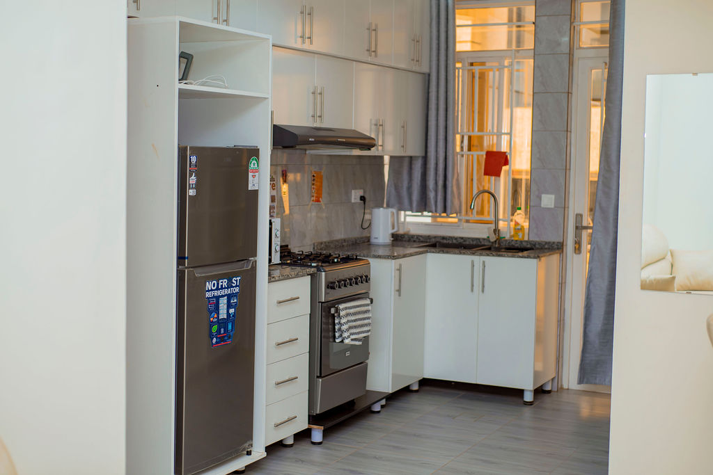 An open-plan kitchen and living area at T & M Luxury Apartments
